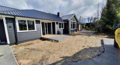 Flat Entrance Entrance to the flat with the house at the back