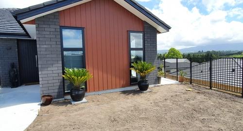 Feature Garden Requiring some softening to connect the house to the property.