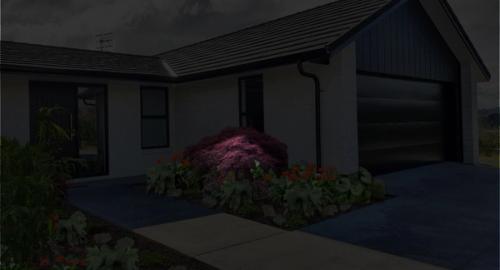 Lighting up the maple trees at night creates a soft welcoming entry