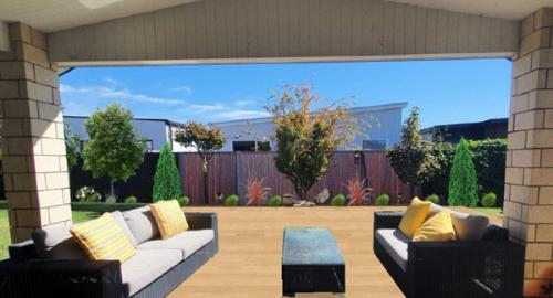 Extending the deck, feature wall & extra planting.
