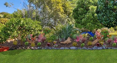 Back Garden Sub-tropical/ native planting creates movement, color & interest all year round