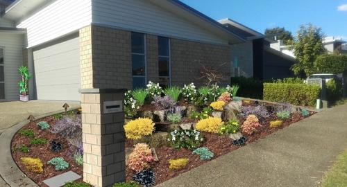 Front Left View With the use of foliage colour, texture and flowers gives this garden all year round interest.