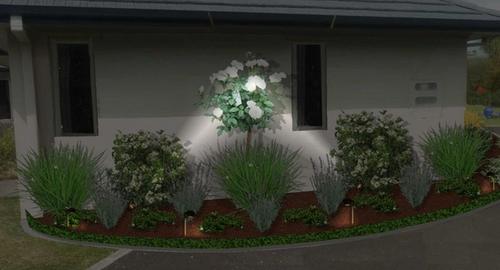 Side of House Side of house after using landscape imaging showing night lighting. This creates interest and added security to the house.