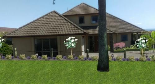 Entry to house after using landscape imaging showing clean and tidy repeat planting. This now creates a visually attractive, low maintenance, cared for entry.