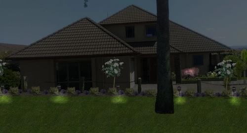 Front Yard Entry to house after using landscape imaging showing night lighting. This creates interest and added security to the house.