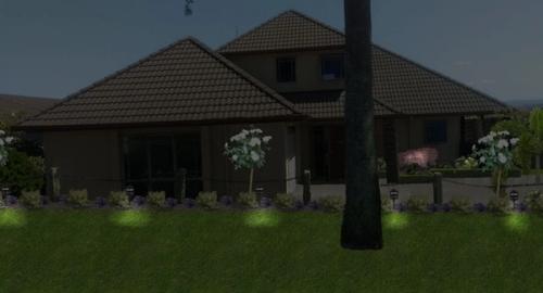 Entry to house after using landscape imaging showing night lighting. This creates interest and added security to the house.