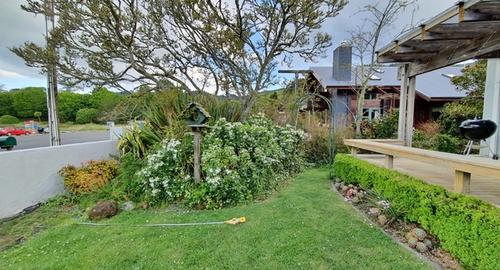 Front Feature Garden Keeping the existing large flaxes to the back of the garden creates some height