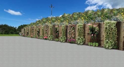 Disguise it with flowers and fragrances. This will not just give you a lovely fragrance but something to put into a vase. Above the retaining wall sow wildflowers to attract the bees and butterflies.