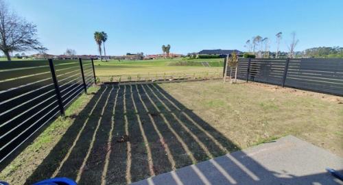 Small lawn area looking out @ golfcourse